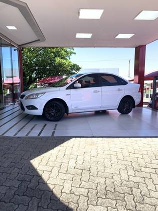 FORD FOCUS 2.0 GHIA SEDAN 16V FLEX 4P MANUAL